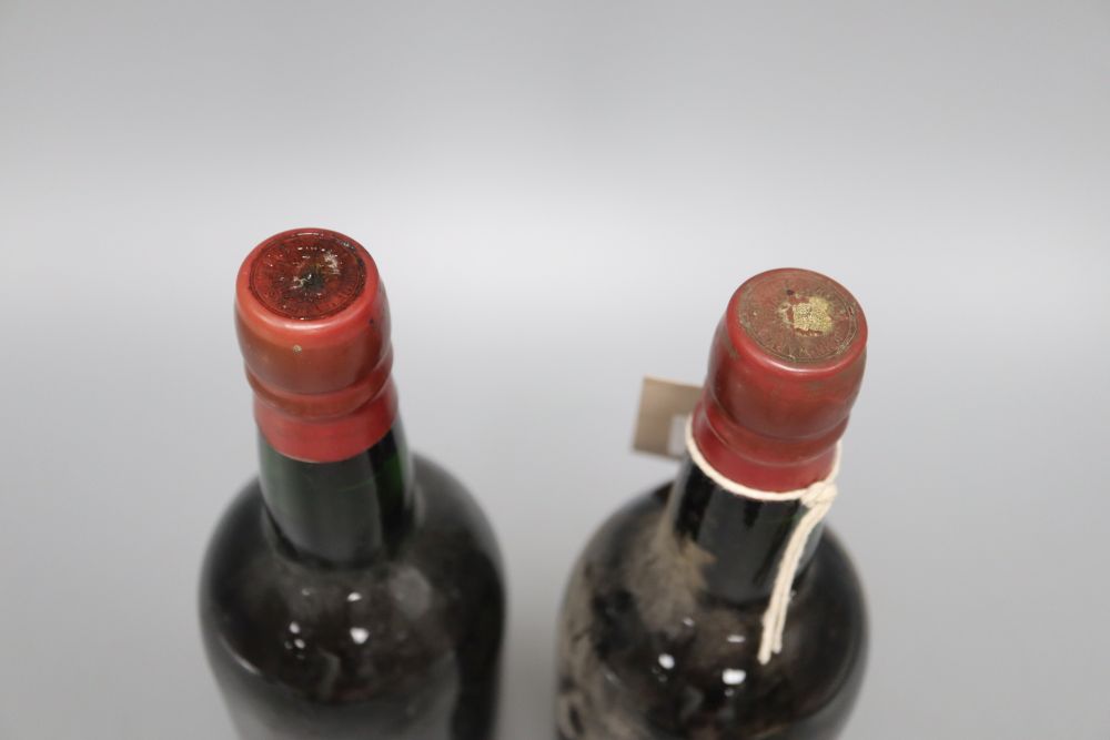 Two bottles of Cockburns 1963 Vintage port